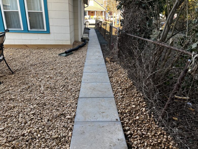 Walkway to back apartment